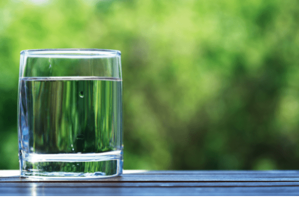 Glass of water nature background