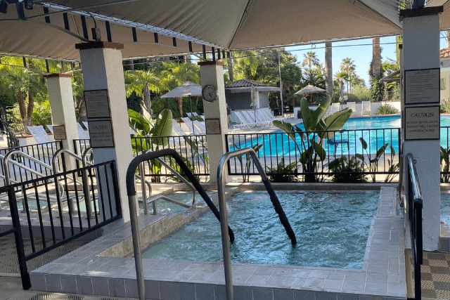 Swimming pool with spa
