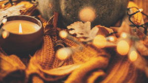 candles and Thanksgiving table decor