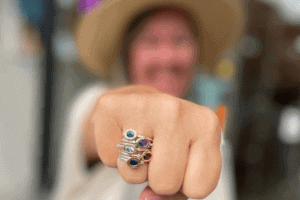 hand with multiple rings on one finger