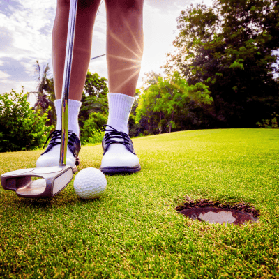 Female golfer at tee