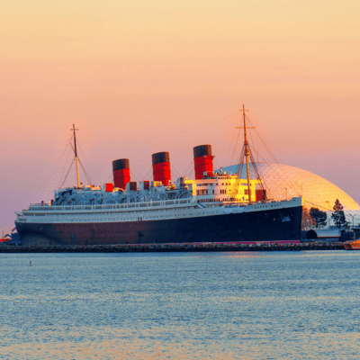 Queen Mary ship at sunset in Long Beach Harbor